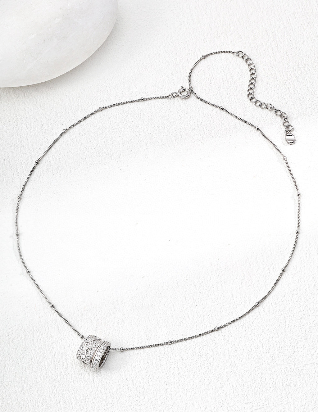 Mira Aura delicate chain necklace with 14k gold plated pendant pave cylinder charm and extender