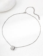 Mira Aura delicate chain necklace with 14k gold plated pendant pave cylinder charm and extender