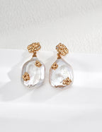 Mira Aura baroque pearl drop earrings with textured gold accents styled to pair with necklaces and pendants