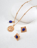 Mira Aura gold plated gemstone necklace with blue lapis coin pendant and matching diamond stud earrings