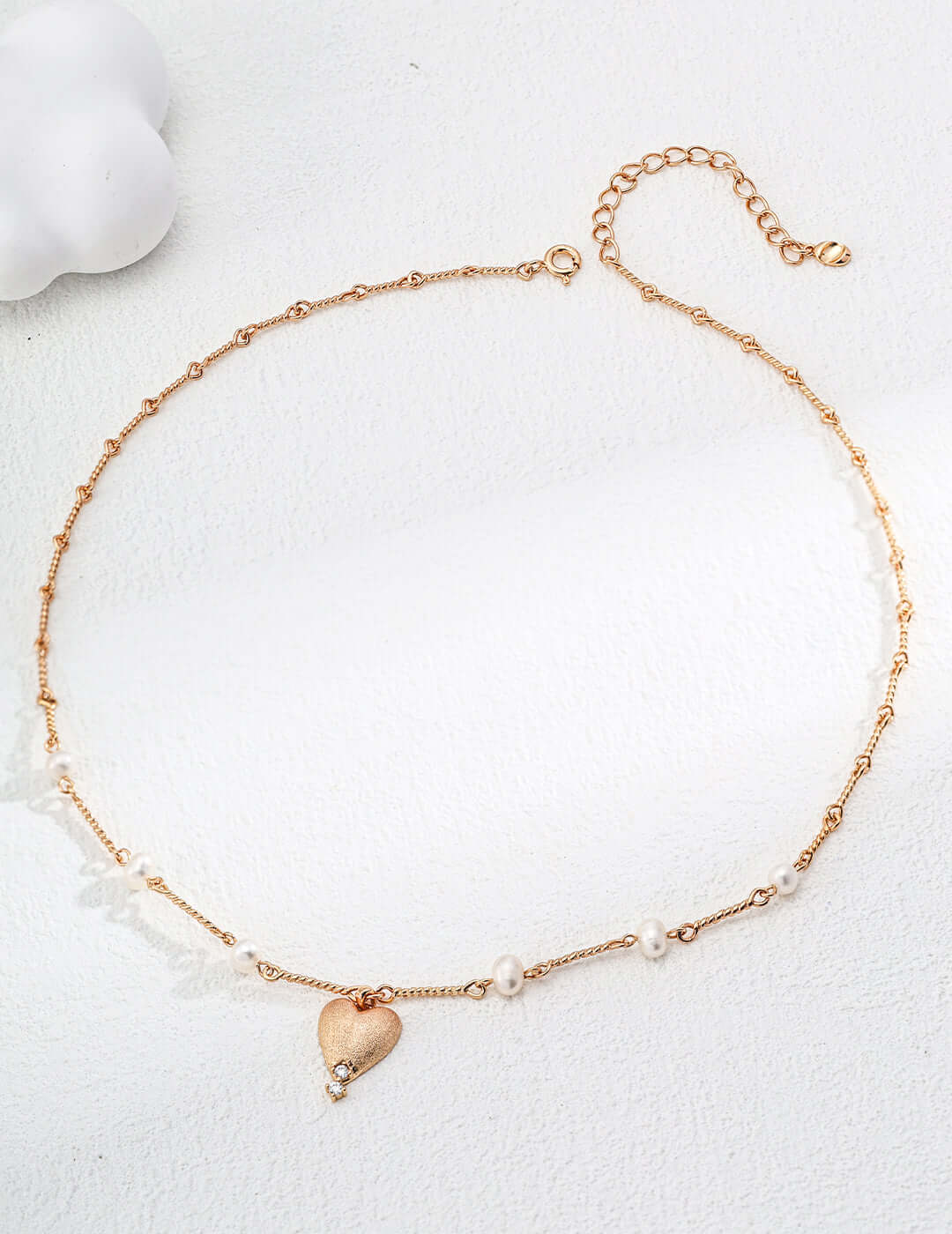 Mira Aura gold plated heart pendant necklace with delicate beaded chain and small pearl accents