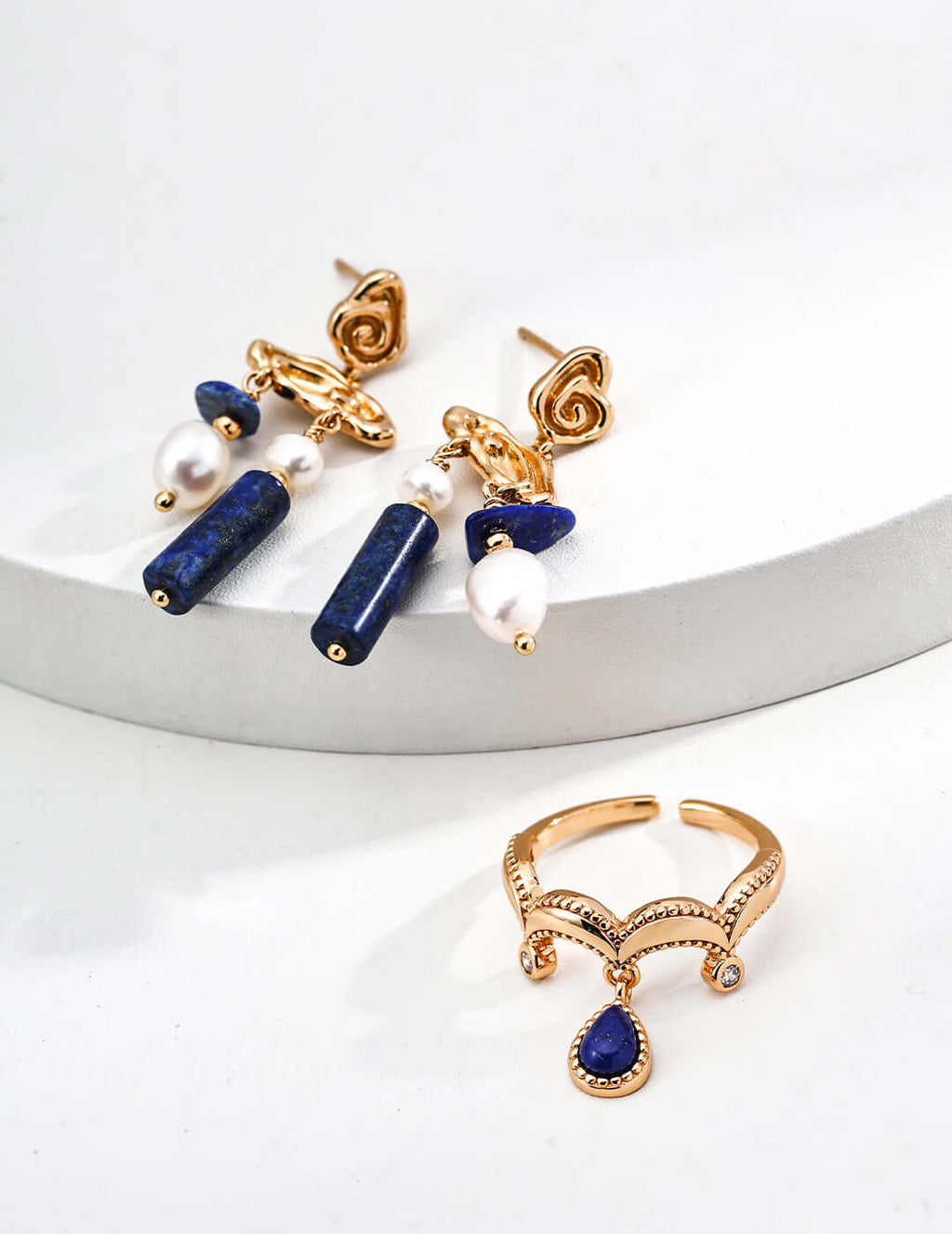 Mira Aura gold adjustable unique gemstone statement ring with blue teardrop stone and crystal accents