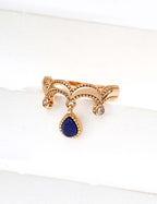Gold scalloped ring with small clear stones and dangling teardrop blue lapis pendant unique gemstone statement ring