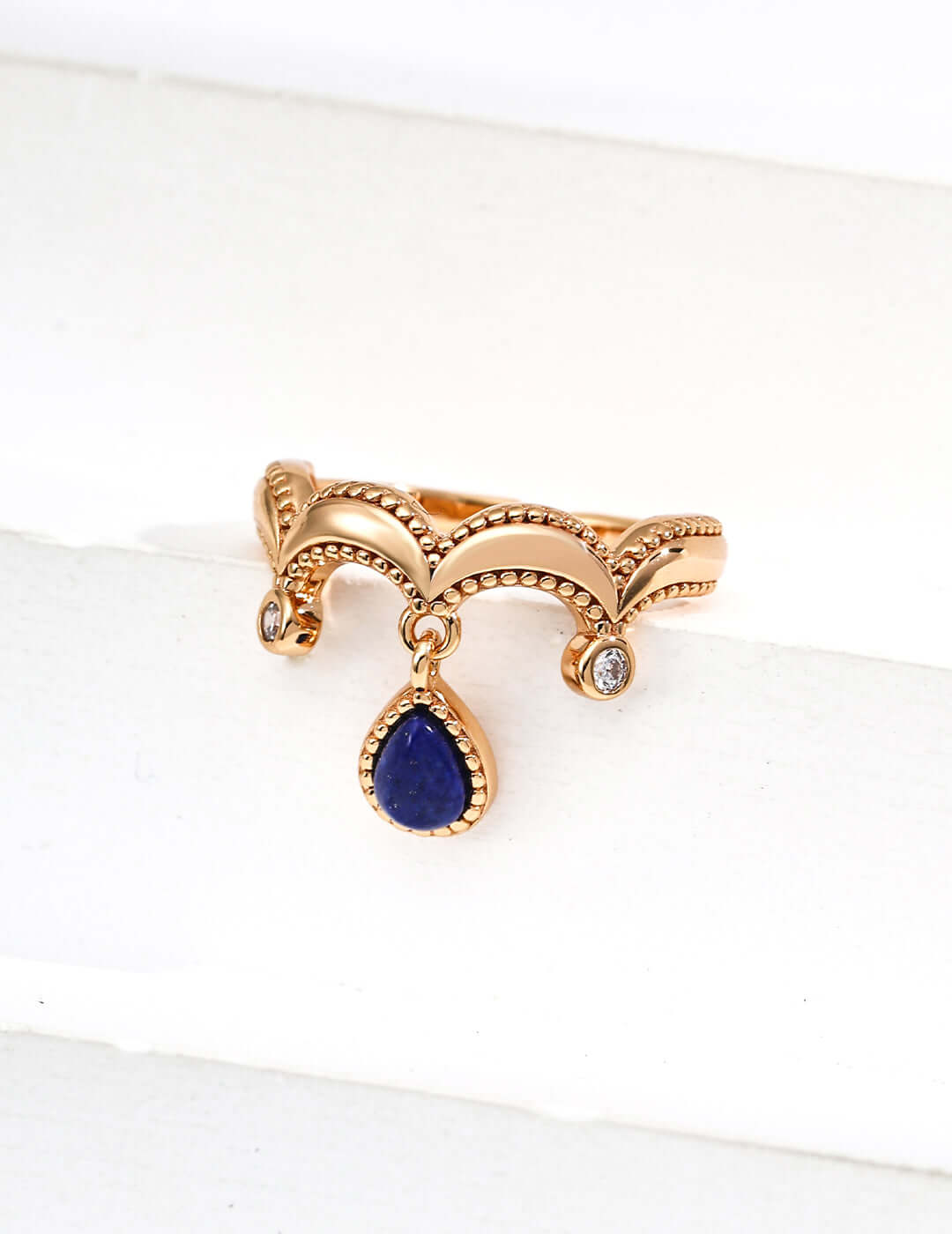 Gold scalloped ring with small clear stones and dangling teardrop blue lapis pendant unique gemstone statement ring