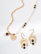 Mira Aura pearl and gemstone necklace for Aries with gold coin charm and matching black stone dangle earrings